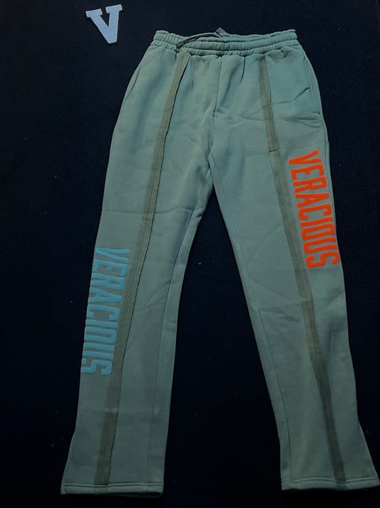 sage green sweatpants with 'VERACIOUS' branding on a black background