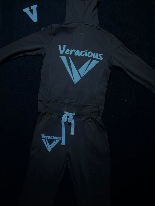 deep chocolate  hoodie and pants set with 'Veracious' logo on a dark background